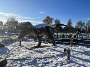 Ice and snow T-Rex at the golf course