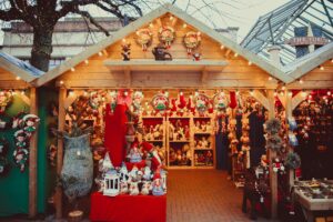 Christmas market stall with decorative ornaments and festive displays