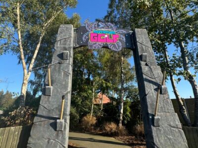 Jurassic-themed stone entrance gate at Wolverhampton Adventure Golf dinosaur mini golf course