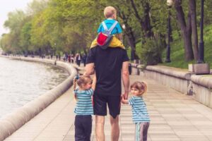 Parent and child walking together on a day out